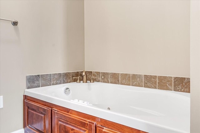 bathroom featuring a whirlpool tub