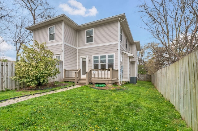 1603A 9th Ave N, Nashville, TN 37208 - back of property featuring a fenced backyard, a lawn, central air condition unit, and a wooden deck