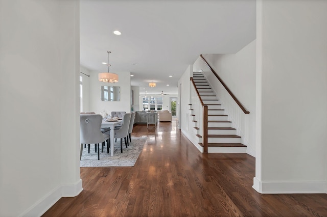 1603A 9th Ave N, Nashville, TN 37208 - dining space featuring recessed lighting, baseboards, stairs, and wood finished floors