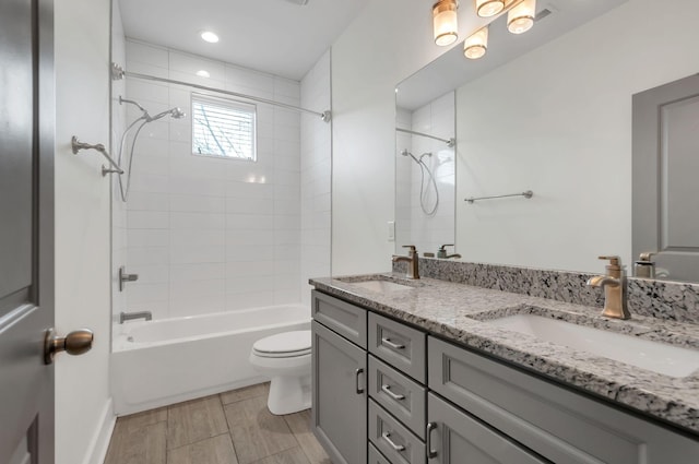 1603A 9th Ave N, Nashville, TN 37208 - bathroom with double vanity, toilet, a sink, and shower / bath combination