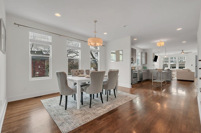 1603A 9th Ave N, Nashville, TN 37208 - dining space with ceiling fan with notable chandelier, recessed lighting, dark wood-style floors, and a wealth of natural light