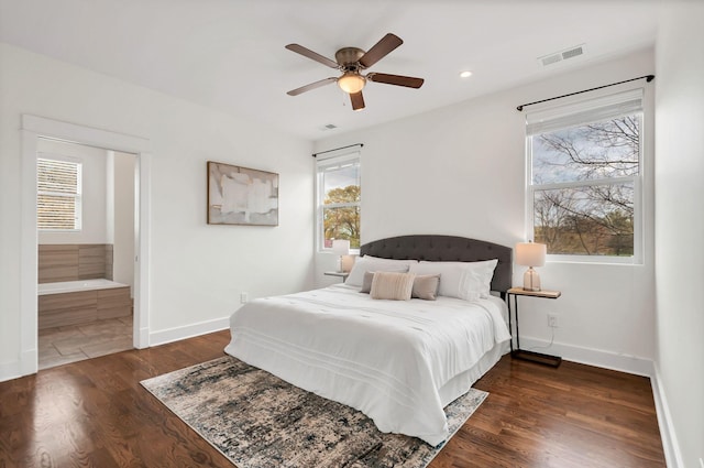 1603A 9th Ave N, Nashville, TN 37208 - bedroom with multiple windows, visible vents, wood finished floors, and baseboards