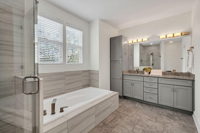 1603A 9th Ave N, Nashville, TN 37208 - bathroom with a garden tub, double vanity, a sink, and a stall shower