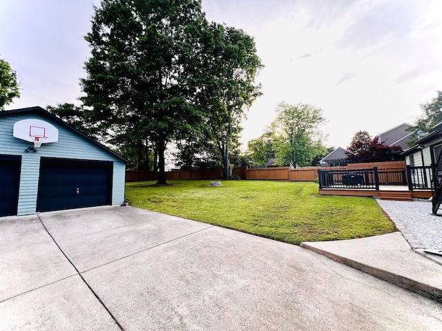 view of yard featuring a deck and an outdoor structure