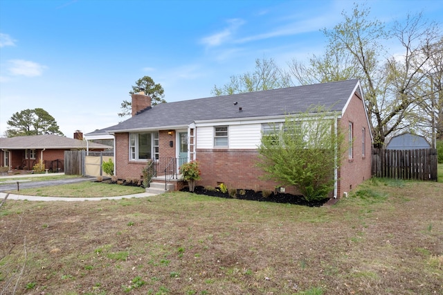 212 S Sequoia Dr, Springfield, TN 37172 - view of front of property with a chimney, fence, a gate, and brick siding