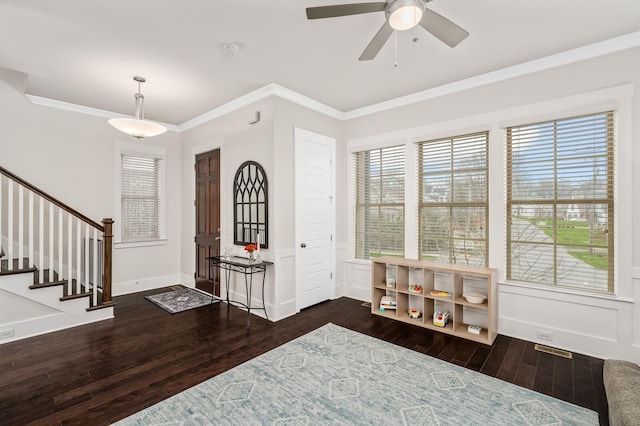 1701 Glen Echo Rd, Nashville, TN 37215 - foyer with stairway, ornamental molding, baseboards, ceiling fan, and wood finished floors