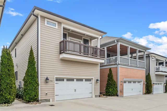 1701 Glen Echo Rd, Nashville, TN 37215 - exterior space with a balcony, concrete driveway, and a garage