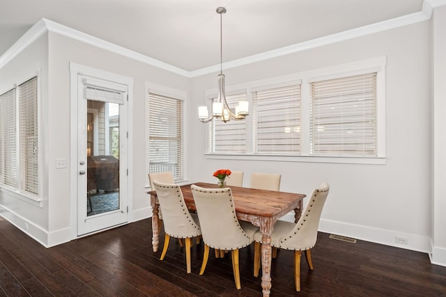 1701 Glen Echo Rd, Nashville, TN 37215 - dining room with ornamental molding, baseboards, dark wood finished floors, visible vents, and a notable chandelier