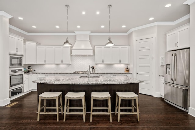 1701 Glen Echo Rd, Nashville, TN 37215 - kitchen with appliances with stainless steel finishes, a sink, an island with sink, custom range hood, and a warming drawer