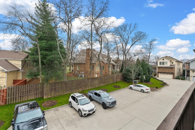 1701 Glen Echo Rd, Nashville, TN 37215 - uncovered parking lot with fence and a residential view