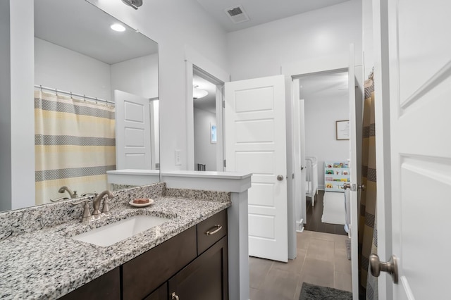 1701 Glen Echo Rd, Nashville, TN 37215 - bathroom with visible vents, tile patterned floors, a shower with shower curtain, and vanity
