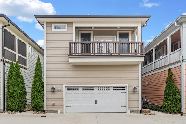 1701 Glen Echo Rd, Nashville, TN 37215 - view of front of home with a balcony, an attached garage, and concrete driveway