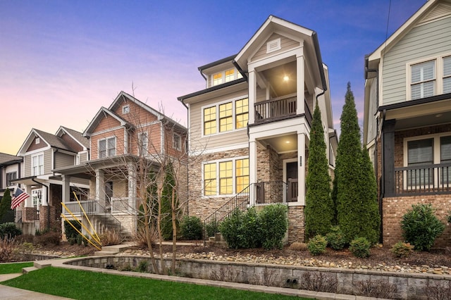 1701 Glen Echo Rd, Nashville, TN 37215 - view of front of property featuring stone siding and a balcony