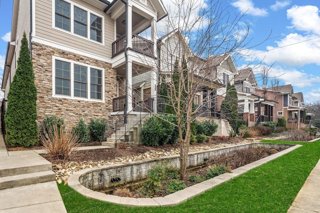 1701 Glen Echo Rd, Nashville, TN 37215 - view of side of home featuring stone siding and a residential view