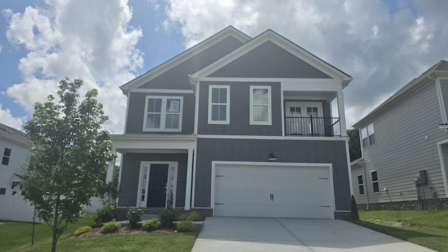 6301 Loudwater Ct, Smyrna, TN 37167 - craftsman-style house featuring an attached garage, driveway, a balcony, and a front yard