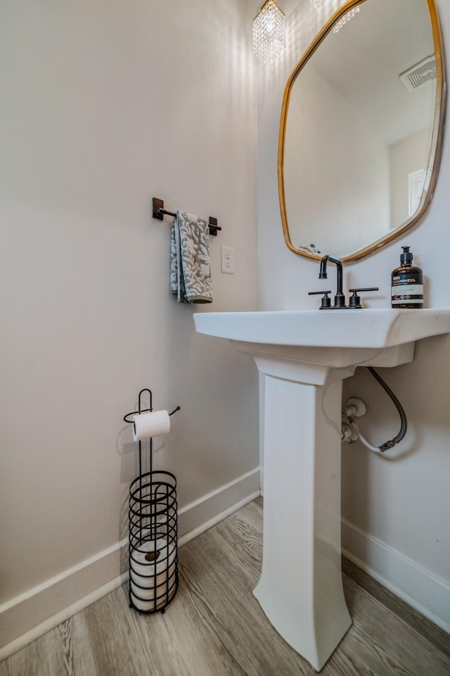 17 Kilkham Ct, Mount Juliet, TN 37122 - bathroom featuring wood finished floors, baseboards, and visible vents