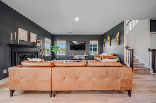 17 Kilkham Ct, Mount Juliet, TN 37122 - living area with baseboards, light wood-type flooring, a fireplace, recessed lighting, and stairway