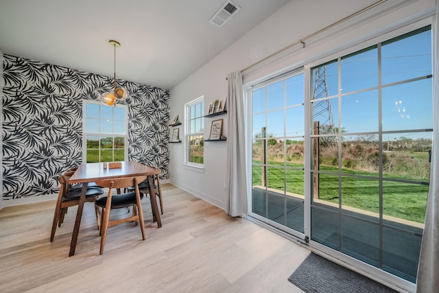 17 Kilkham Ct, Mount Juliet, TN 37122 - dining area with an inviting chandelier, light wood-type flooring, visible vents, wallpapered walls, and baseboards