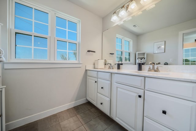17 Kilkham Ct, Mount Juliet, TN 37122 - bathroom with a sink, visible vents, baseboards, and double vanity