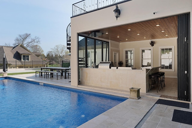 9812 Windrose Cir, Chattanooga, TN 37421 - view of pool featuring stairway, a fenced in pool, fence, a patio, and outdoor dry bar