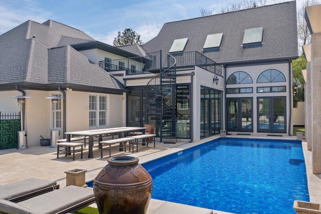 9812 Windrose Cir, Chattanooga, TN 37421 - back of house with an outdoor pool, stairs, roof with shingles, french doors, and a patio area