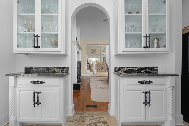 9812 Windrose Cir, Chattanooga, TN 37421 - bar with arched walkways and light wood finished floors