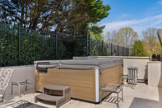 9812 Windrose Cir, Chattanooga, TN 37421 - view of patio with fence and a hot tub