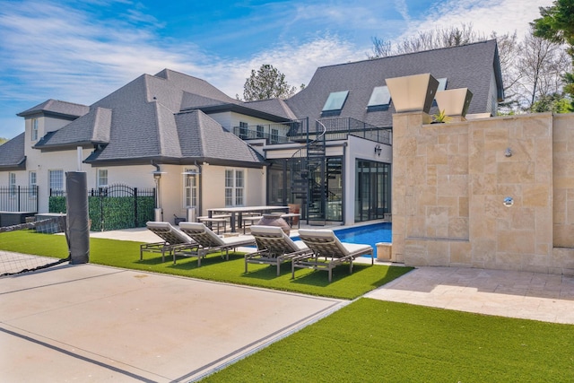 9812 Windrose Cir, Chattanooga, TN 37421 - rear view of property with fence, a fenced in pool, a shingled roof, a yard, and a patio area