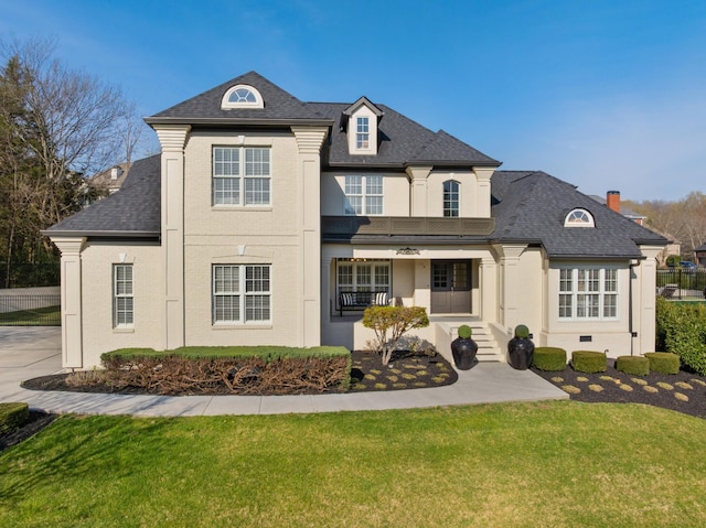9812 Windrose Cir, Chattanooga, TN 37421 - french country home with brick siding and a front yard