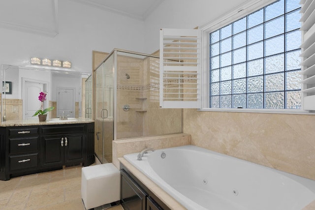 9812 Windrose Cir, Chattanooga, TN 37421 - full bathroom with vanity, ornamental molding, a jetted tub, and a shower stall