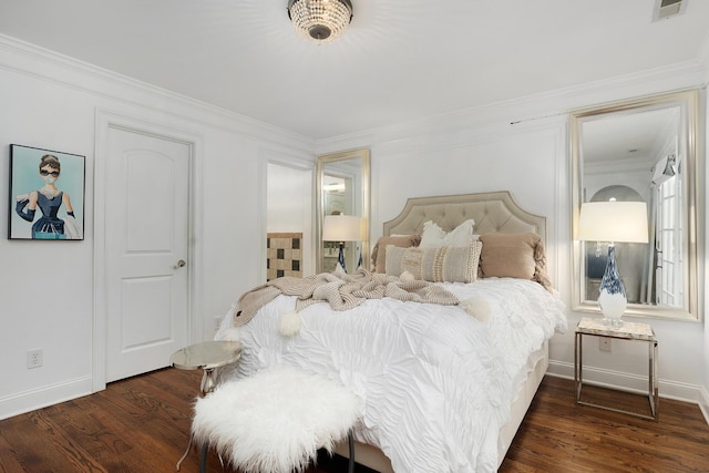 9812 Windrose Cir, Chattanooga, TN 37421 - bedroom featuring crown molding, baseboards, connected bathroom, dark wood-style floors, and visible vents