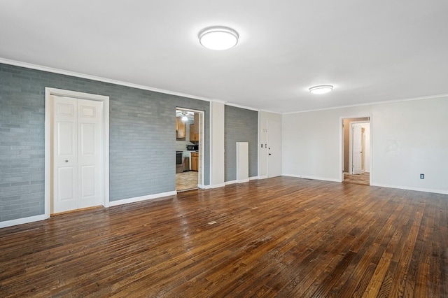 interior space featuring baseboards, crown molding, and dark wood-type flooring