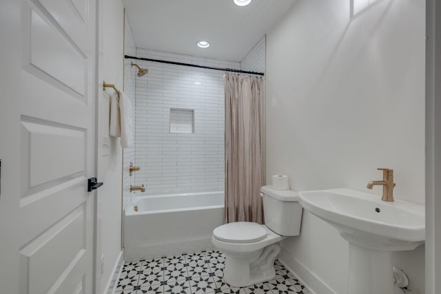 808A 45th Ave N, Nashville, TN 37209 - full bathroom with baseboards, toilet, tile patterned floors, recessed lighting, and shower / bath combo with shower curtain