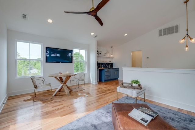 808A 45th Ave N, Nashville, TN 37209 - living area with ceiling fan, visible vents, vaulted ceiling, and light wood-type flooring