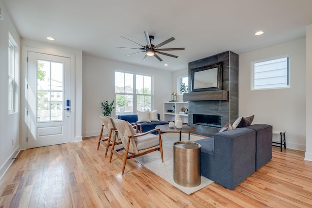 808A 45th Ave N, Nashville, TN 37209 - living area featuring a large fireplace, a ceiling fan, recessed lighting, and light wood-type flooring