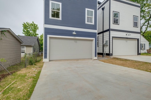 808A 45th Ave N, Nashville, TN 37209 - view of front of home featuring an attached garage and fence