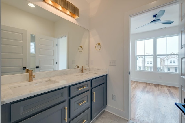 808A 45th Ave N, Nashville, TN 37209 - full bath featuring baseboards, double vanity, a sink, and recessed lighting