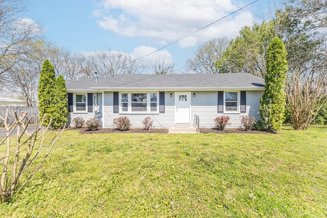 single story home with a front lawn