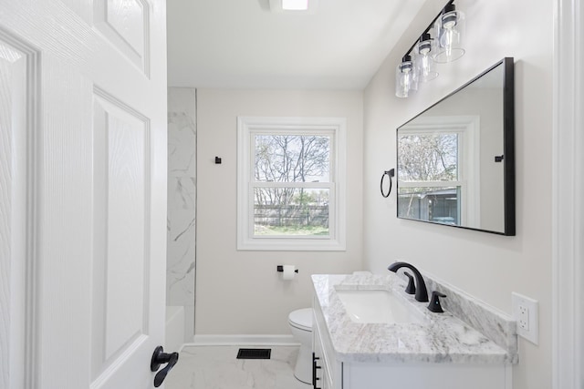 full bath featuring a wealth of natural light, vanity, visible vents, and marble finish floor