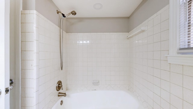 bathroom with shower / bath combination
