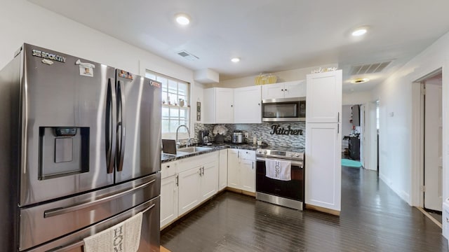 120 Gatone Dr, Hendersonville, TN 37075 - kitchen featuring appliances with stainless steel finishes, a sink, white cabinetry, and visible vents
