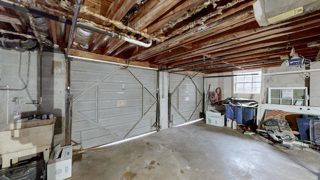 120 Gatone Dr, Hendersonville, TN 37075 - garage featuring a garage door opener and a sink