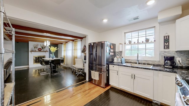 120 Gatone Dr, Hendersonville, TN 37075 - kitchen featuring tasteful backsplash, visible vents, stainless steel refrigerator with ice dispenser, a sink, and white cabinetry