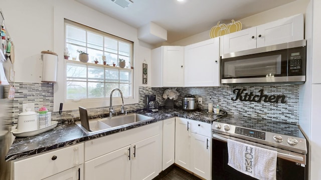 120 Gatone Dr, Hendersonville, TN 37075 - kitchen featuring a sink, white cabinetry, and stainless steel appliances