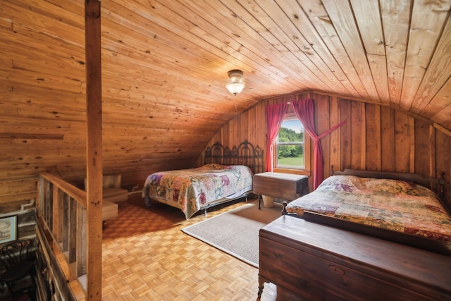 bedroom featuring wood walls and vaulted ceiling