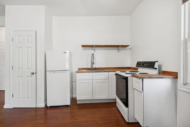 1902 Meridian St, Nashville, TN 37207 - kitchen featuring a sink, open shelves, dark wood finished floors, white appliances, and white cabinets