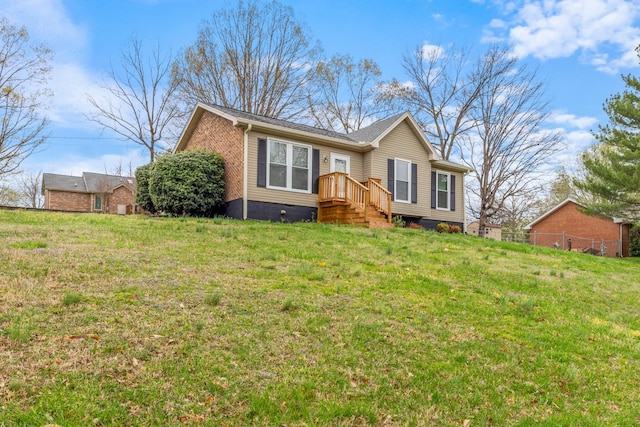 view of front of house with a front lawn