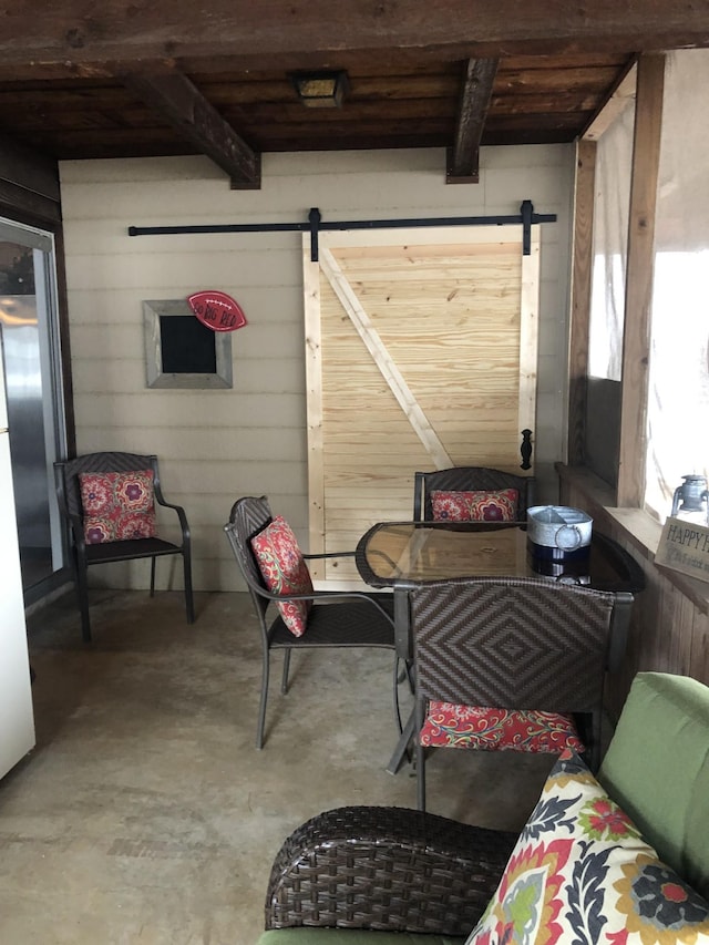 832 Pineview Dr, Springville, TN 38256 - interior space featuring beamed ceiling and a barn door