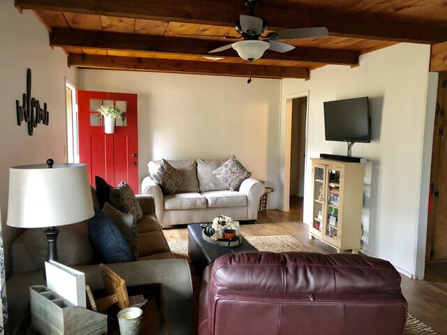 832 Pineview Dr, Springville, TN 38256 - living area with wood finished floors, wood ceiling, beam ceiling, and ceiling fan