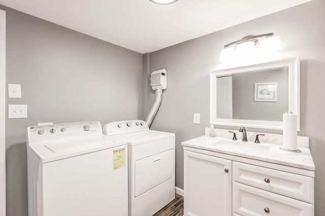 5267 Lickton Pike, Goodlettsville, TN 37072 - washroom with dark wood-style flooring, independent washer and dryer, a sink, and cabinet space
